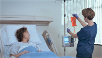 Patient Receiving IV Therapy With the Alaris Pump System