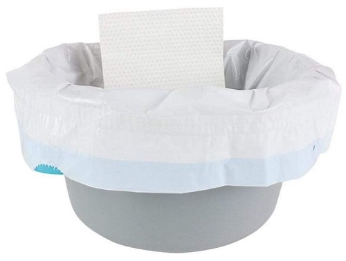 A commode liner in the commode pail.