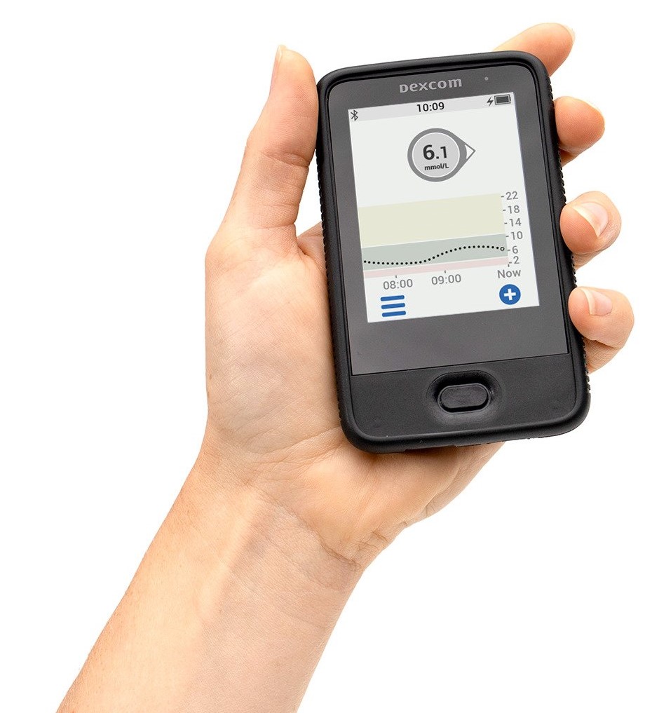 data-element= A hand holds the receiver device