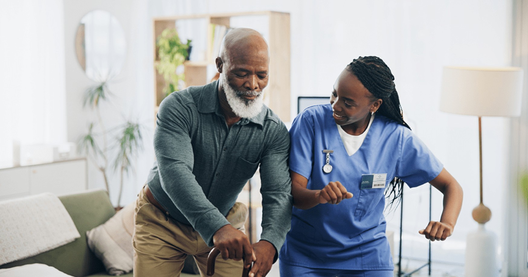 Home health care professional assisting a patient