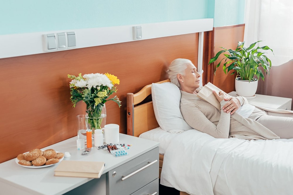 Woman relaxes in a comfortable home healthcare room