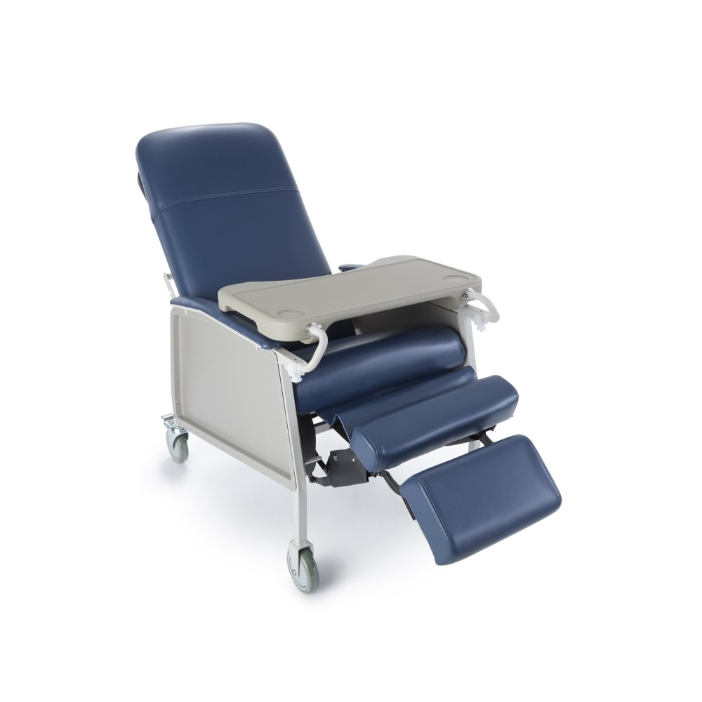 A ComfortEZ Recliner shown with activity tray and elevated foot rest.