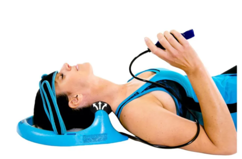 Woman using posture pump neck traction device and holding the hand pump