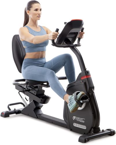 Woman sitting posture and peddling on a recumbent bike