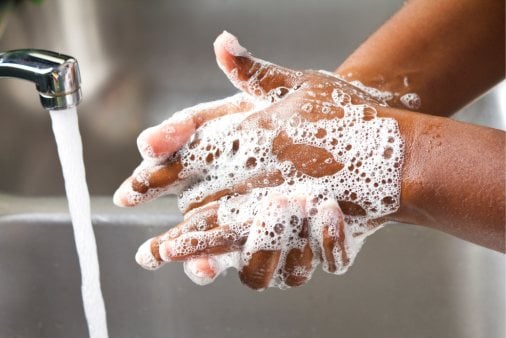 Handwashing with soapy suds and water